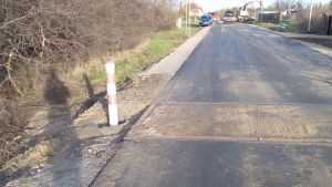Prace wykończeniowe - pobocza i próg zwalniający